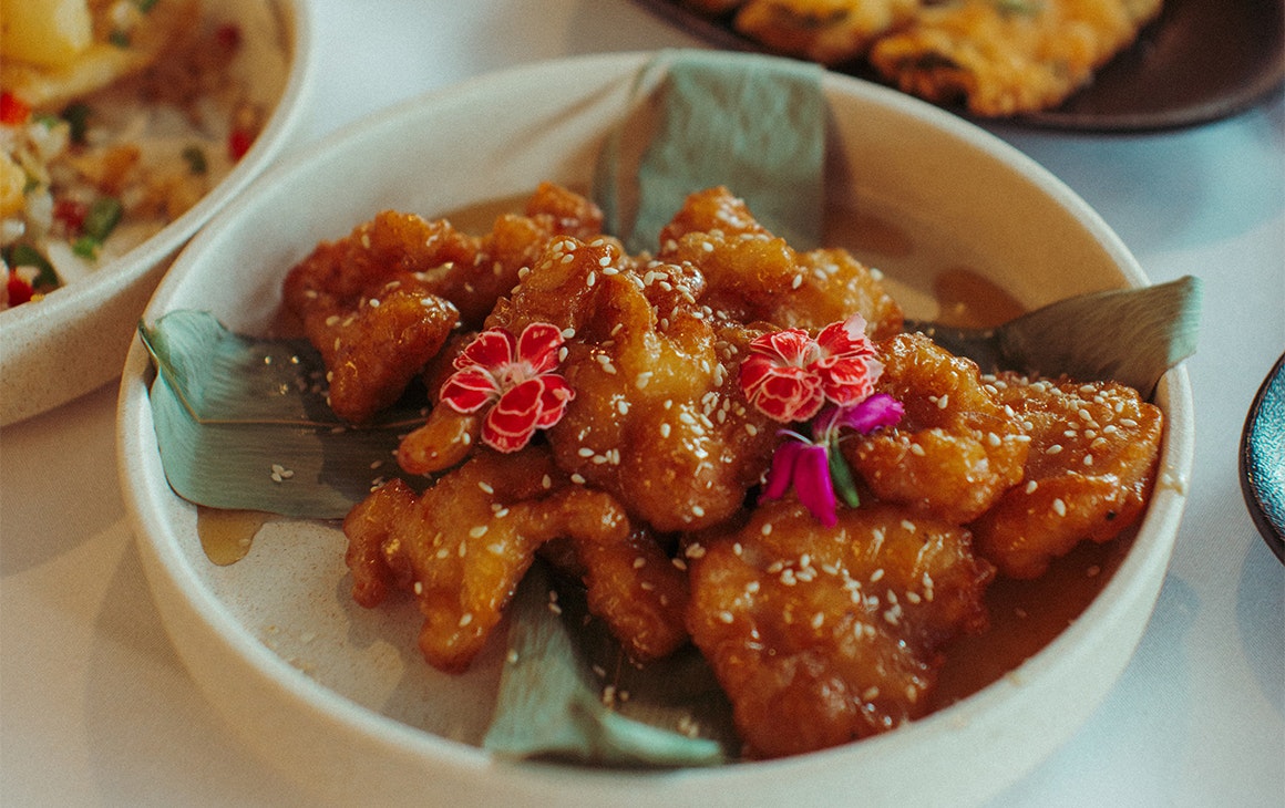 a plate of crunchy chicken in sauce